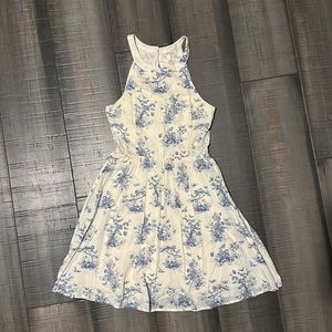 White Dress with Blue Flowers and Side Lace Details